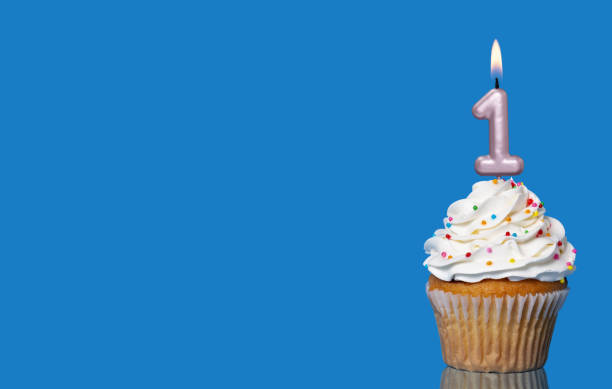 istock Birthday Cupcake With Candle Number 1 Lit. 2165363251