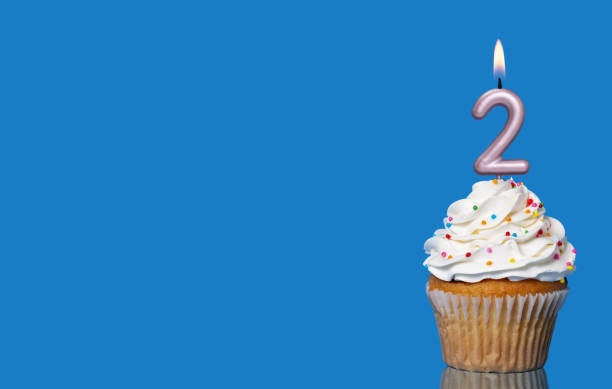 istock Birthday Cupcake With Candle Number 2 Lit. 2165363280