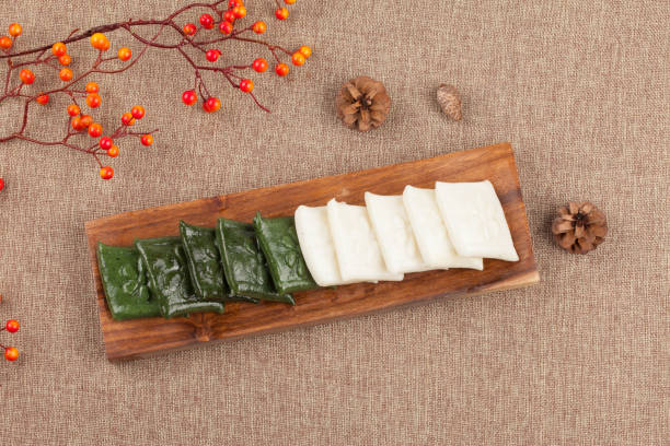 istock Rice cake made by pressing with rice cake meat into a square or round shape. It can also be made with things like mugwort or dyed in various colors. 2165368635