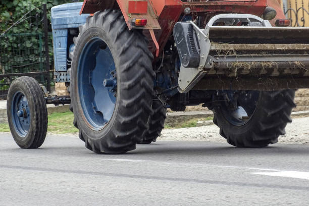 istock A tractor moves on the road during the summer 2165370264