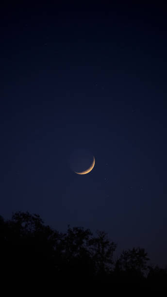 istock Crescent Moon, planet conjunction and landscape scenery silhouettes. 2165372076