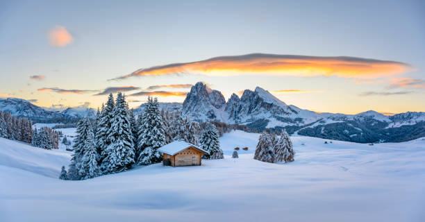 istock Panoramic view on Alpe di Siusi meadow with small wooden log cabin 2165373505