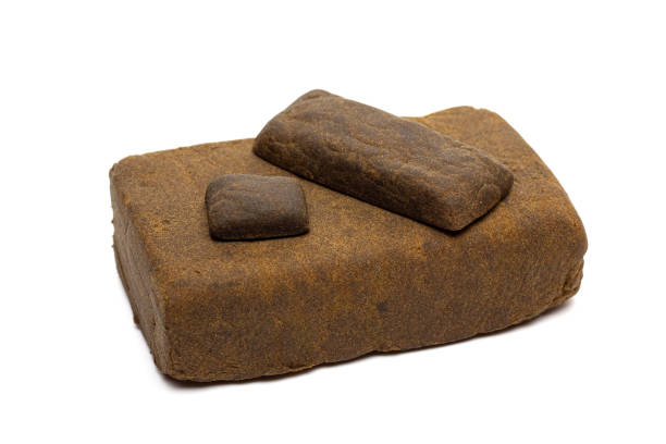 istock Blocks of hashish isolated on white background 2165373769