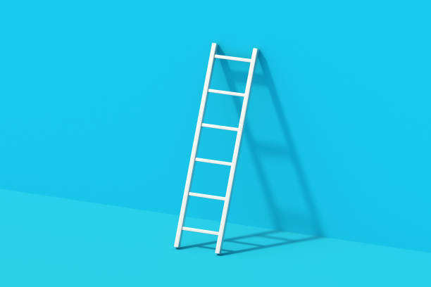 istock Ladder with hard shadow near blue wall. Construction equipment. Tool for repair. 3d render 2165375460