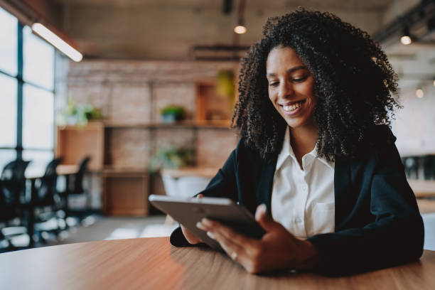 istock Young businesswoman using digital tablet 2165381048