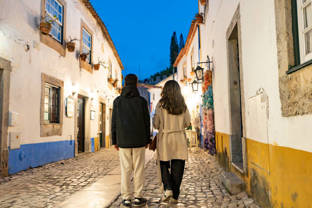 istock Tourists walking through the European streets 2165385843