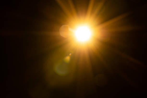 istock Sun flare on the black background 2165387115