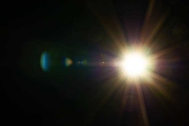 istock Sun flare on the black background 2165387164
