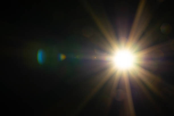 istock Sun flare on the black background 2165387183