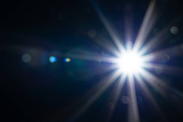 istock Sun flare on the black background 2165387204
