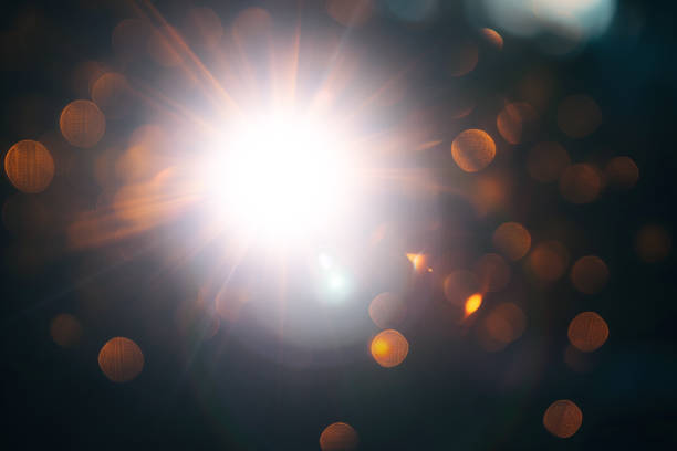 istock Abstract Natural Sun flare or Far star on the black background 2165387723