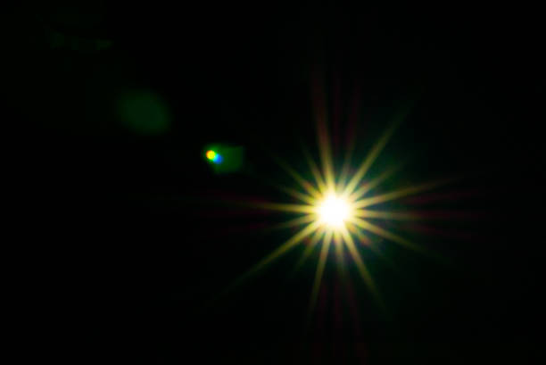 istock Sun flare on the black background 2165388126