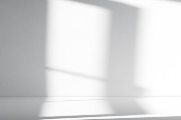 istock Background White Wall Studio with Shadow window, light on empty  floor for cosmetic product,Grey Background Room Cement Surface Texture  with Podium Display stand mock up for Autumn,Winter banner 2165388707