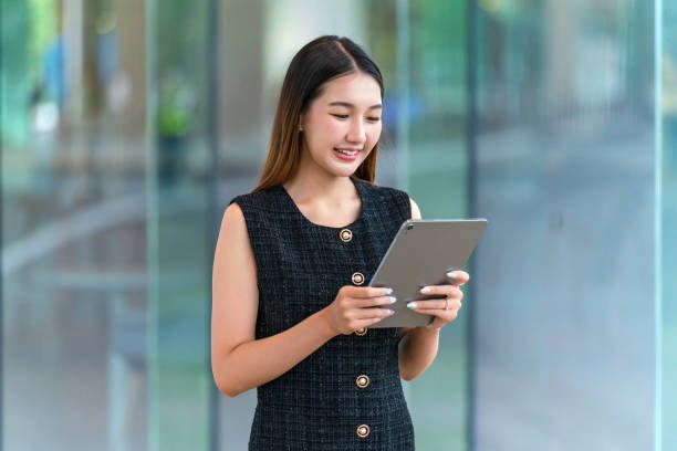 istock Young Businesswoman Using A Tablet 2165389963
