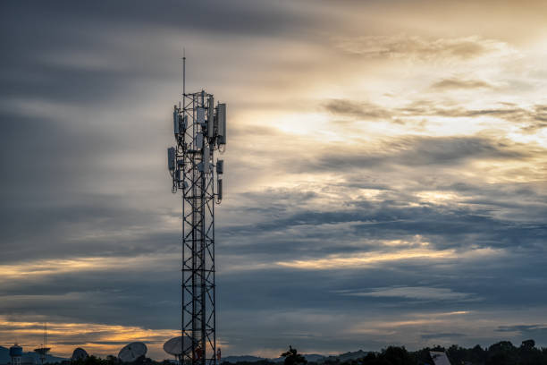 istock Telecommunication antenna receiver on cell phone tower with 5G base station transceiver on beautiful sunrise background. 2165390857