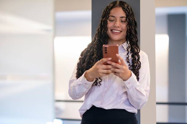 istock Happy young woman working remotely 2165396195