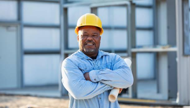 istock Mature African-American man working at construction site 2165396411