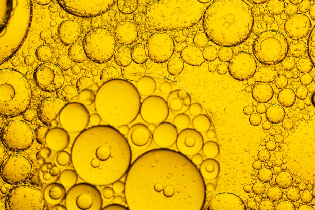 istock Yellow micro bubble texture,Multi colored bubbles of oil and water 2165396664