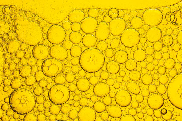 istock Yellow micro bubble texture,Multi colored bubbles of oil and water 2165396721