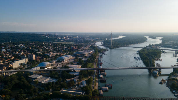 istock Panoramic view of Belgrade Fair and Ada Bridge spanning the Sava River at sunset 2165400026