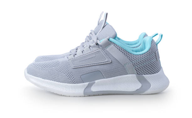 istock Women's sneakers isolated on white. 2165404397