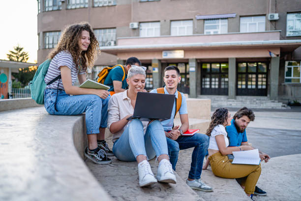 istock Group of students on the campus stairs 2165404743