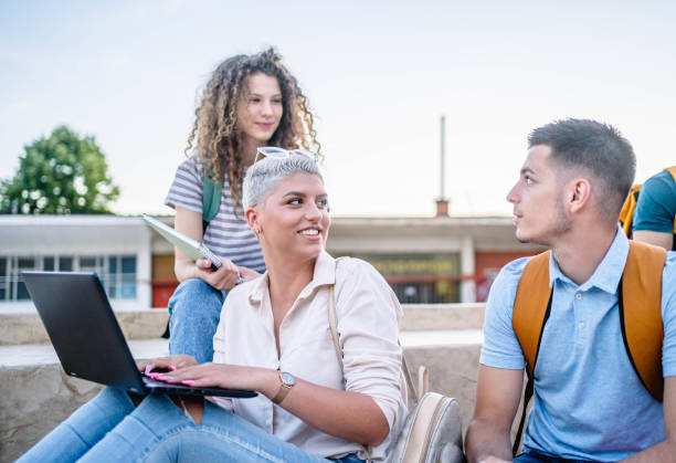 istock Group of students on the campus stairs 2165405043