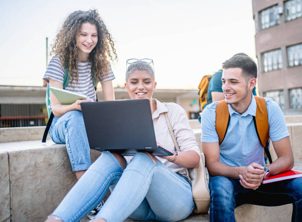 istock Group of students on the campus stairs 2165405056