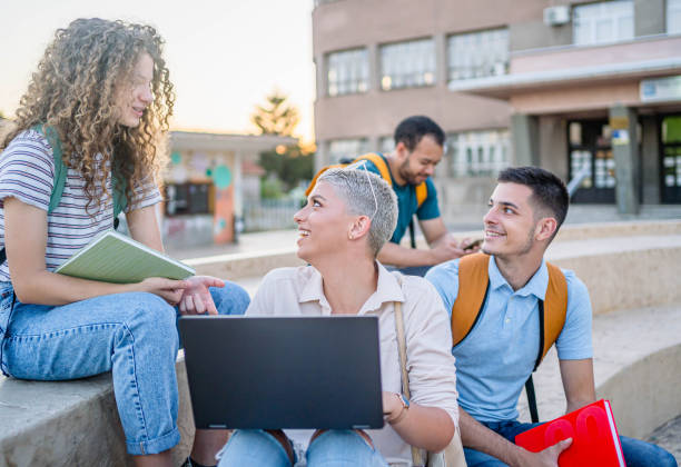 istock Group of students on the campus stairs 2165405301