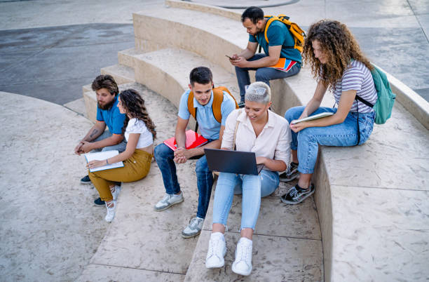 istock Group of students on the campus stairs 2165405312