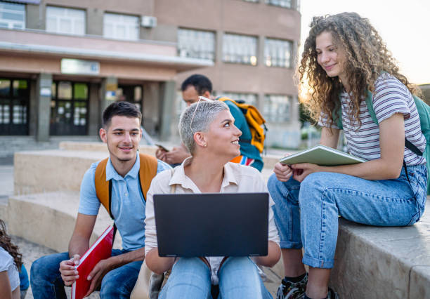istock Group of students on the campus stairs 2165405352