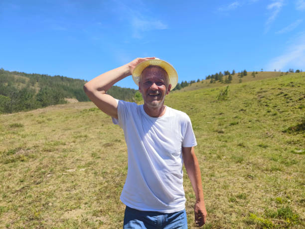 Man relaxing and enjoy in nature, taking a break from a stressful city life