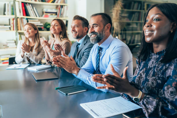 istock Multi-ethnic group of business persons during a conference 2165409420
