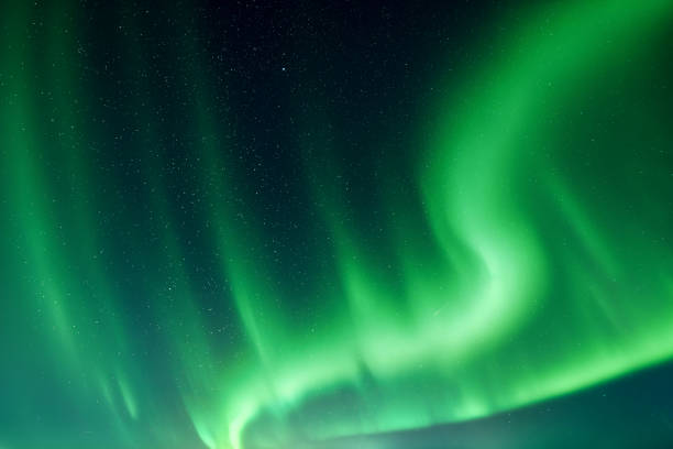 istock Sky with green polar lights and stars 2165410707
