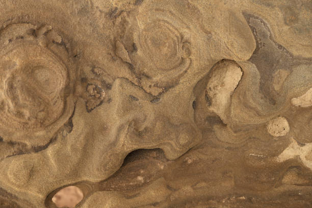 istock Intricate Sandstone Swirls and Erosion Patterns 2165411266