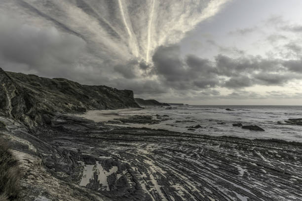 istock Dramatic Clouds over Carriagem Beach, Portugal 2165411334