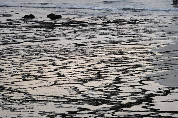 Tide Patterns on Sand at Vila Nova de Milfontes, Portugal