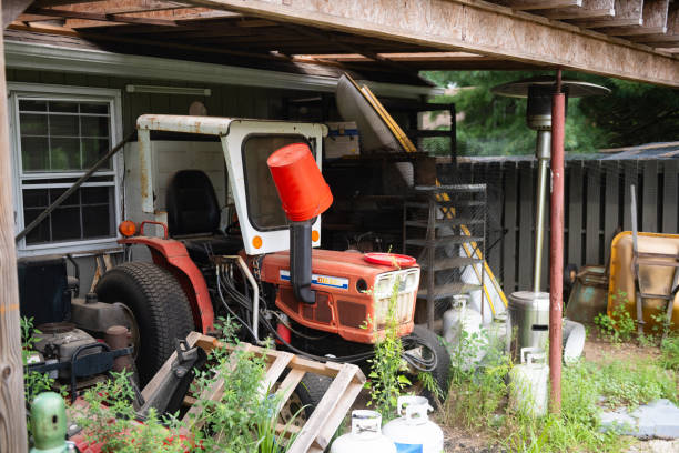 This is a photograph of farm equipment by a tool shed on a New Jersey farm on a summer day in Middlesex County