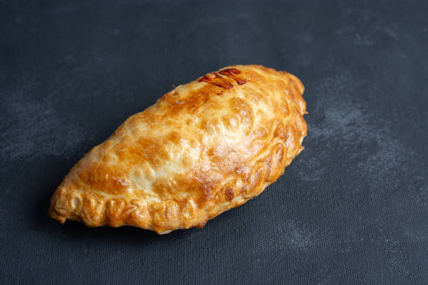 istock Argentine empanada on a black background 2165416775