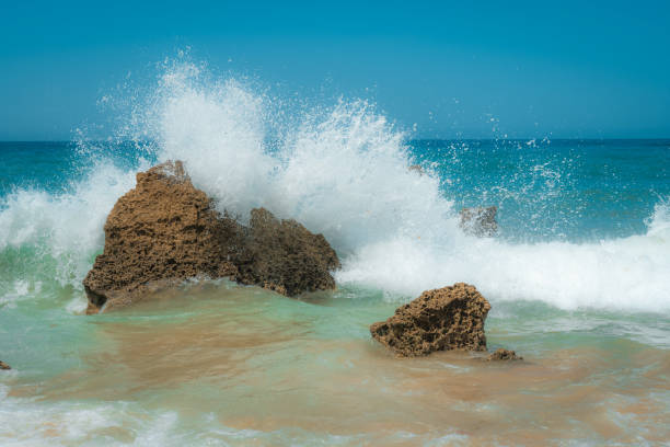 Ocean Waves Crashing Into Rocks