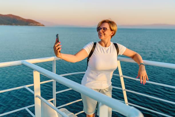 istock A famale tourist on a ferry 2165423528
