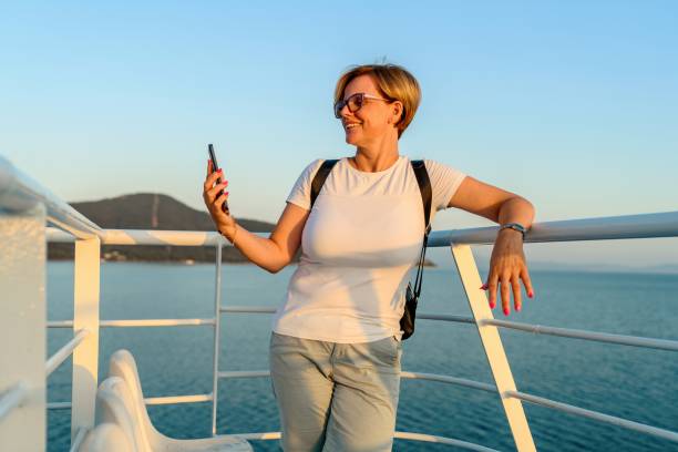 istock A famale tourist on a ferry 2165424278