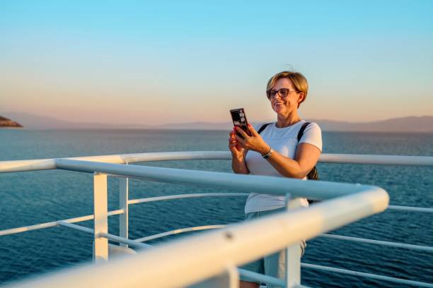 istock A famale tourist on a ferry 2165425372