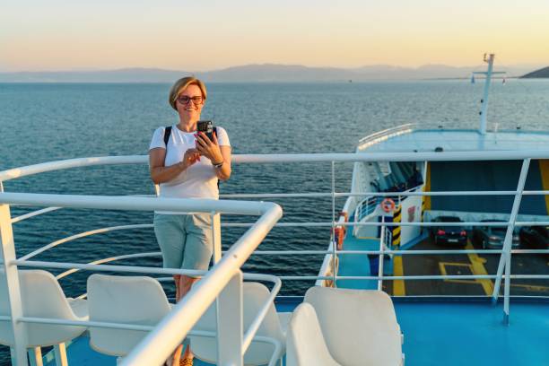 istock A famale tourist on a ferry 2165425971