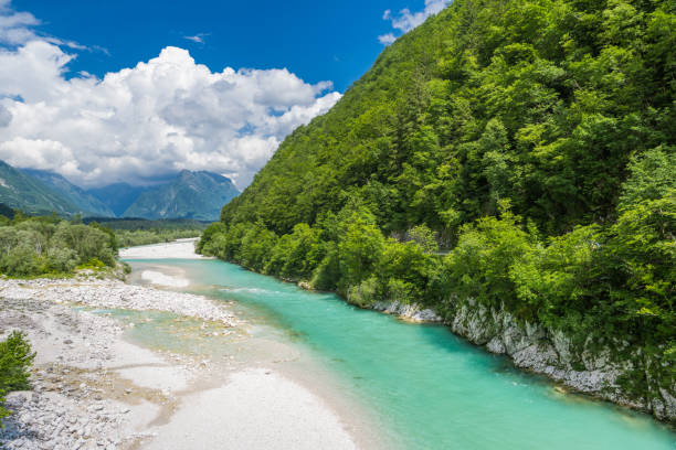 istock Turquoise Soca River Winding Through Lush Green Mountains 2165427988