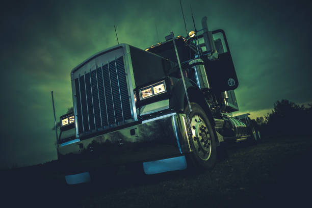 istock Semi-Truck Parked at Night 2165429212