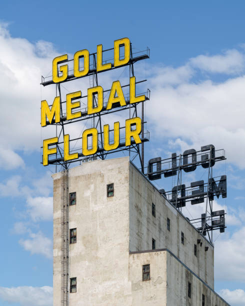 Minneapolis, Minnesota, USA - July 22, 2024: Iconic Gold Medal Flour sign (1910) on W River Pkwy in downtown Minneapolis