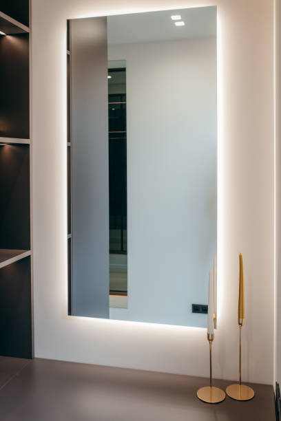 istock Modern desk with mirror in the room 2165432168
