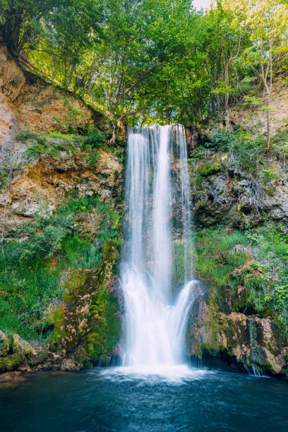 istock Veliki Buk waterfall in Serbia flows gracefully through a lush green forest, its cascading waters blending harmoniously with the natural beauty of the landscape. 2165432296