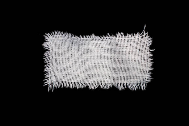 pieces of canvas, white rag on a black background